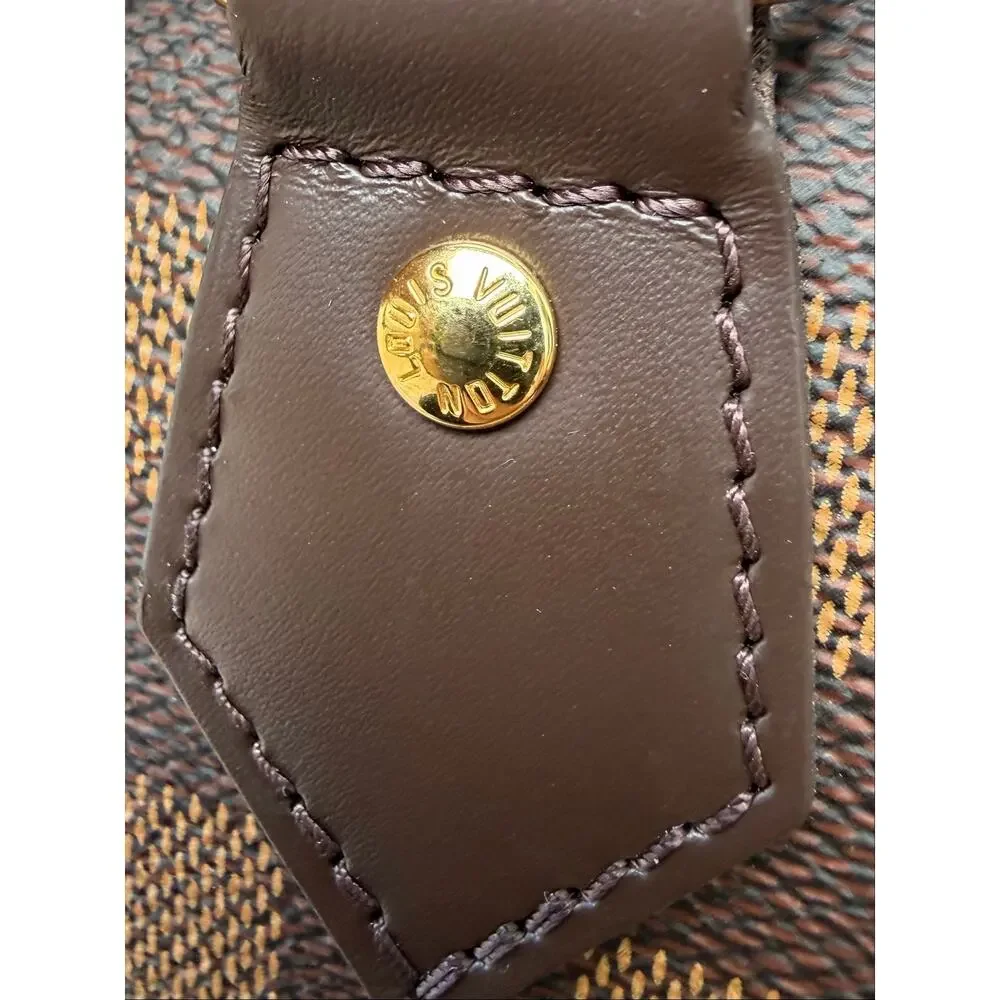 Louis Vuitton Damier Ebene Alma Handbag